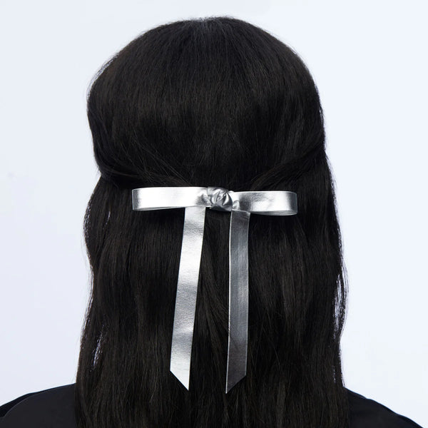 Lele Sadoughi SILVER BARDOT FAUX LEATHER BOW BARRETTE